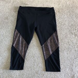 Fabletics Black and gold cropped leggings in size M